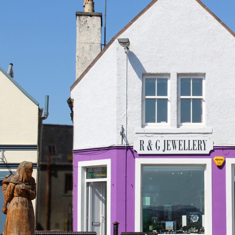 Image of R&G jewellery workshop behind Stornoway wooden statue of Herring Girl